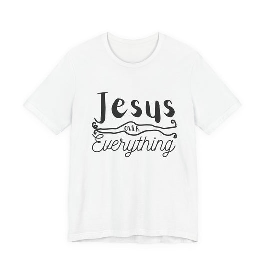 White t-shirt with 'Jesus Over Everything' text on a white background